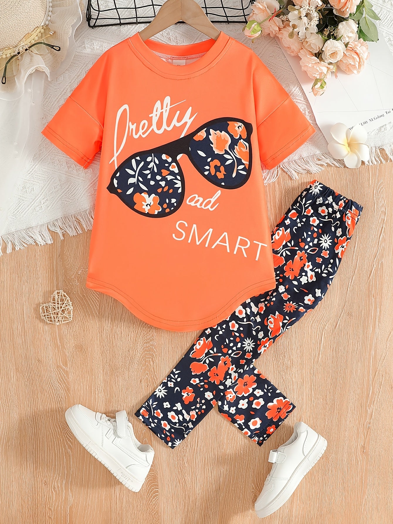 [Summer Outfit] 2pcs Girls' Summer Outfit | Large Glasses Print Pattern Drop Shoulder Irregular Hem Design Loose Short Sleeve T-Shirt + Floral Print Skinny Nine-Tenths Bottoms Set - Holiday Gift Girls' Fashion Casual Kids Sui
