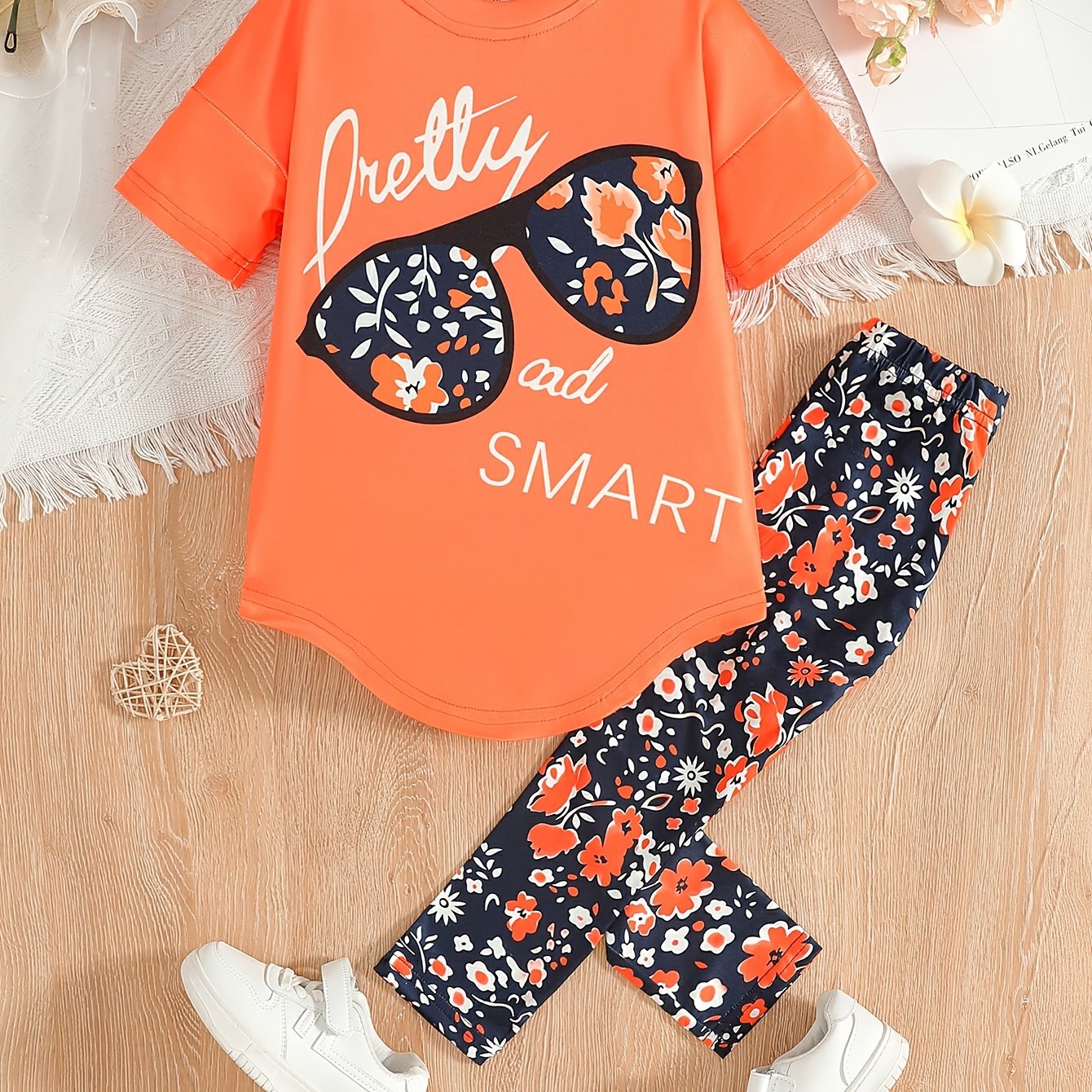 [Summer Outfit] 2pcs Girls' Summer Outfit | Large Glasses Print Pattern Drop Shoulder Irregular Hem Design Loose Short Sleeve T-Shirt + Floral Print Skinny Nine-Tenths Bottoms Set - Holiday Gift Girls' Fashion Casual Kids Sui