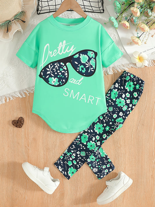 [Summer Outfit] 2pcs Girls' Summer Outfit | Large Glasses Print Pattern Drop Shoulder Irregular Hem Design Loose Short Sleeve T-Shirt + Floral Print Skinny Nine-Tenths Bottoms Set - Holiday Gift Girls' Fashion Casual Kids Sui