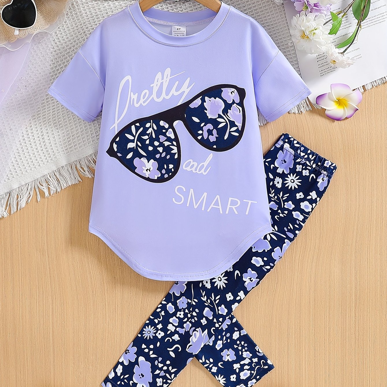 [Summer Outfit] 2pcs Girls' Summer Outfit | Large Glasses Print Pattern Drop Shoulder Irregular Hem Design Loose Short Sleeve T-Shirt + Floral Print Skinny Nine-Tenths Bottoms Set - Holiday Gift Girls' Fashion Casual Kids Sui